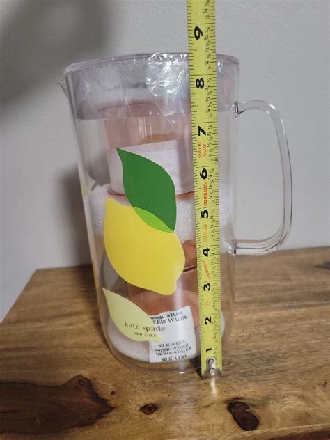 Its time for backyard BBQs, poolside hangouts, and delicious, refreshing drinks. . Kate spade lemon pitcher
